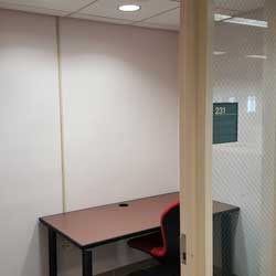 Table with seating for one in a Study Room