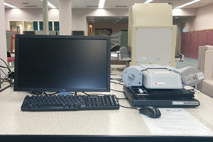 Computer monitor and adjacent ScanPro 2000 machine
