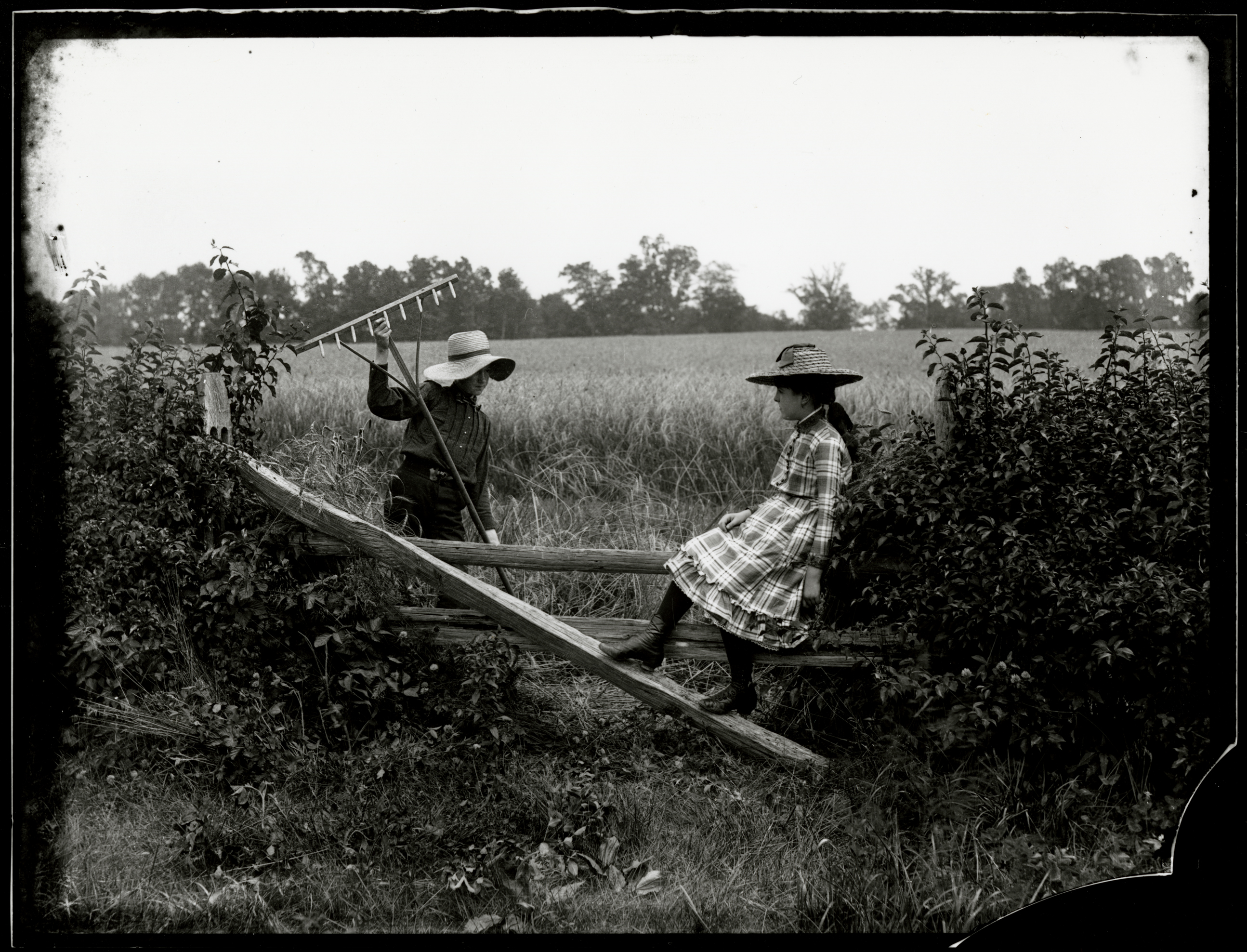 An Idle Moment, On Fence Near Salem, circa 1898 by John G. Bullock