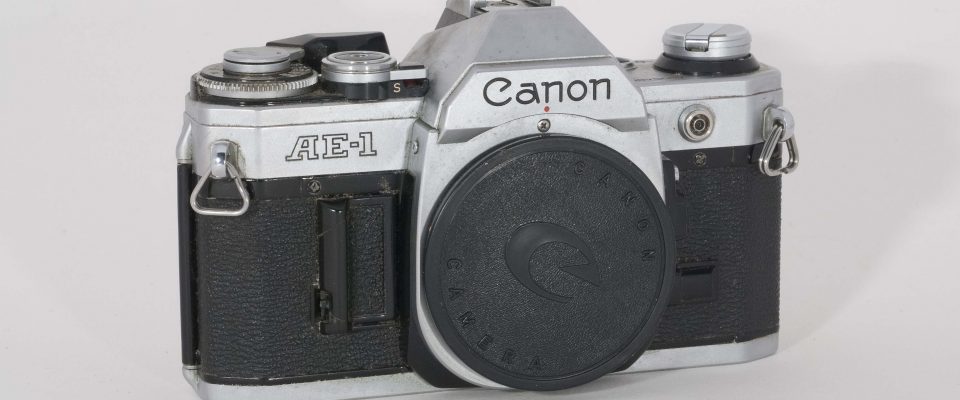 Canon AE-1, 1981. Front view, angled to right, no lens.