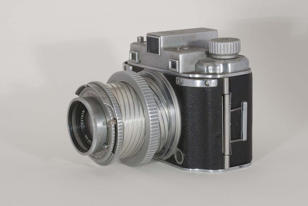 Kodak Medalist II, 1946-1953. Side view, lens fully extended, angled to left.