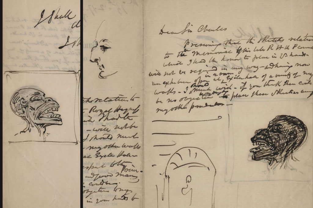 A letter with cursive writing that features a sketch of a Black man with very exaggerated features and a sketch of a white man. 