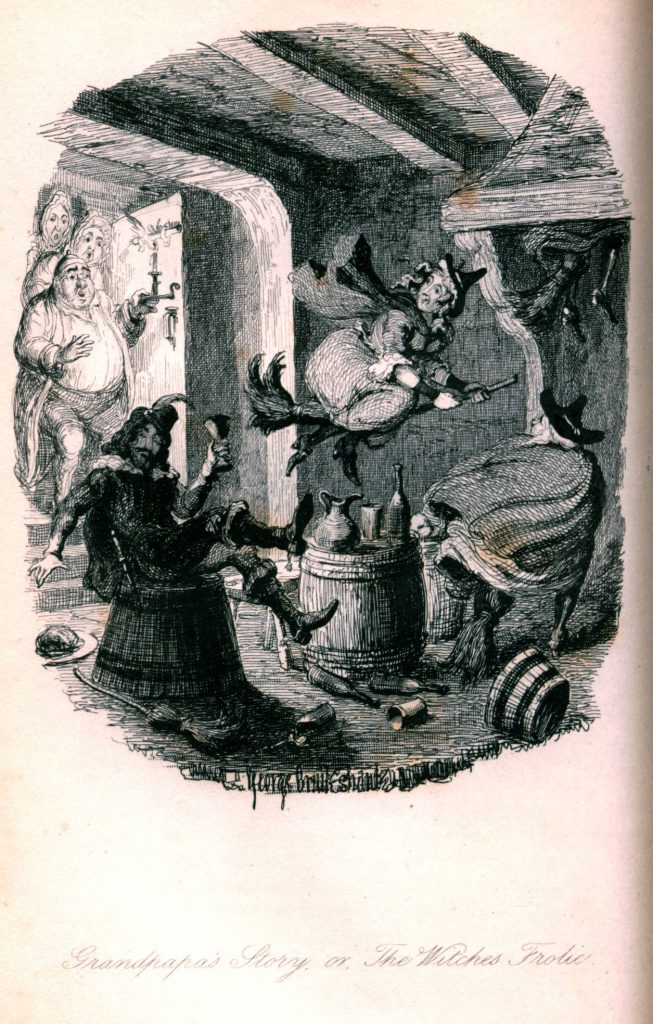 Three witches fly on brooms in a house, much to the surprise of the three men who enter through the door to see them.