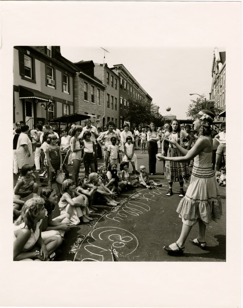 Children gathered to watch performers