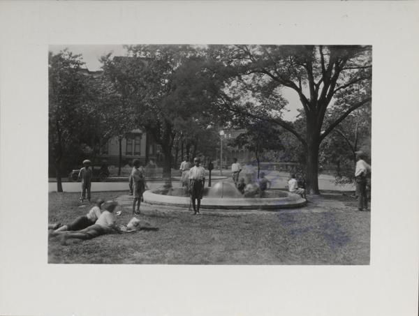 Children playing in fountain