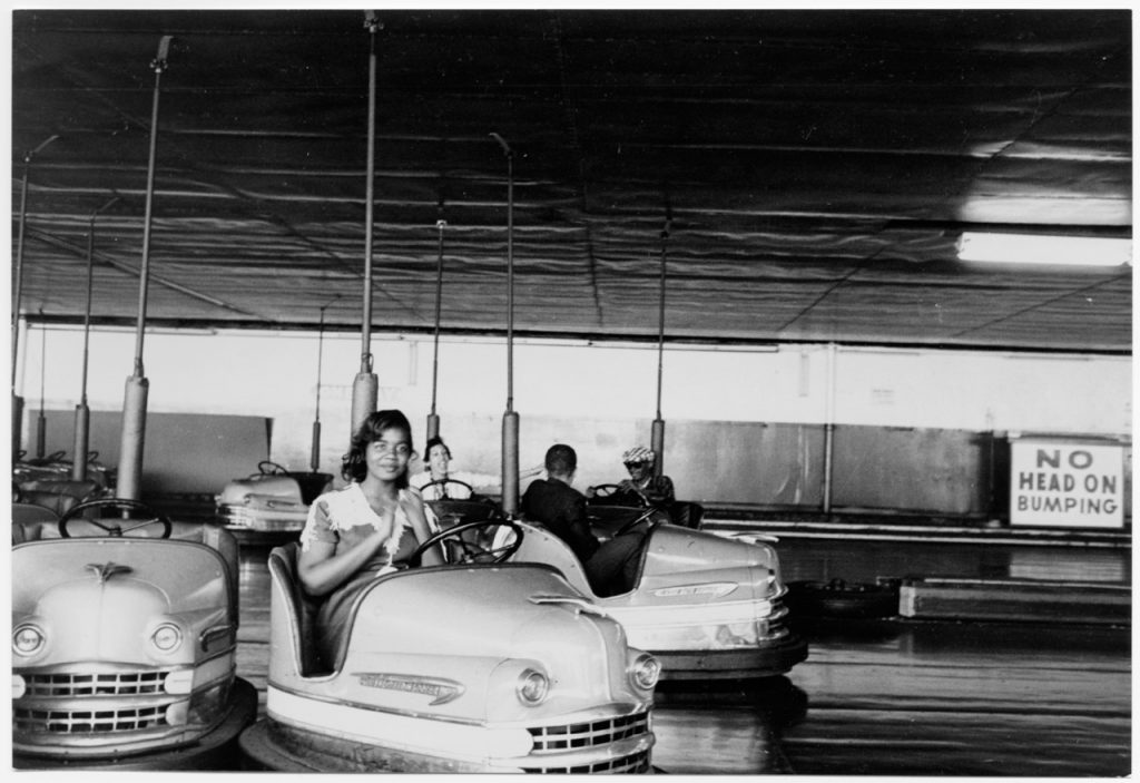 Llittle rock nine kids visiting coney island pictured on bumper cars