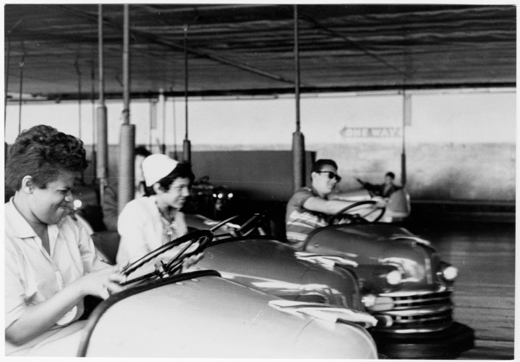 Little rock nine kids visiting coney island pictured on bumper cars