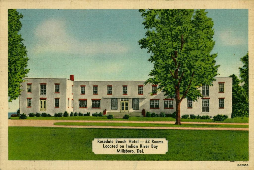 Postcard of Rosedale Hotel in Delaware, a large, two story white building with many windows