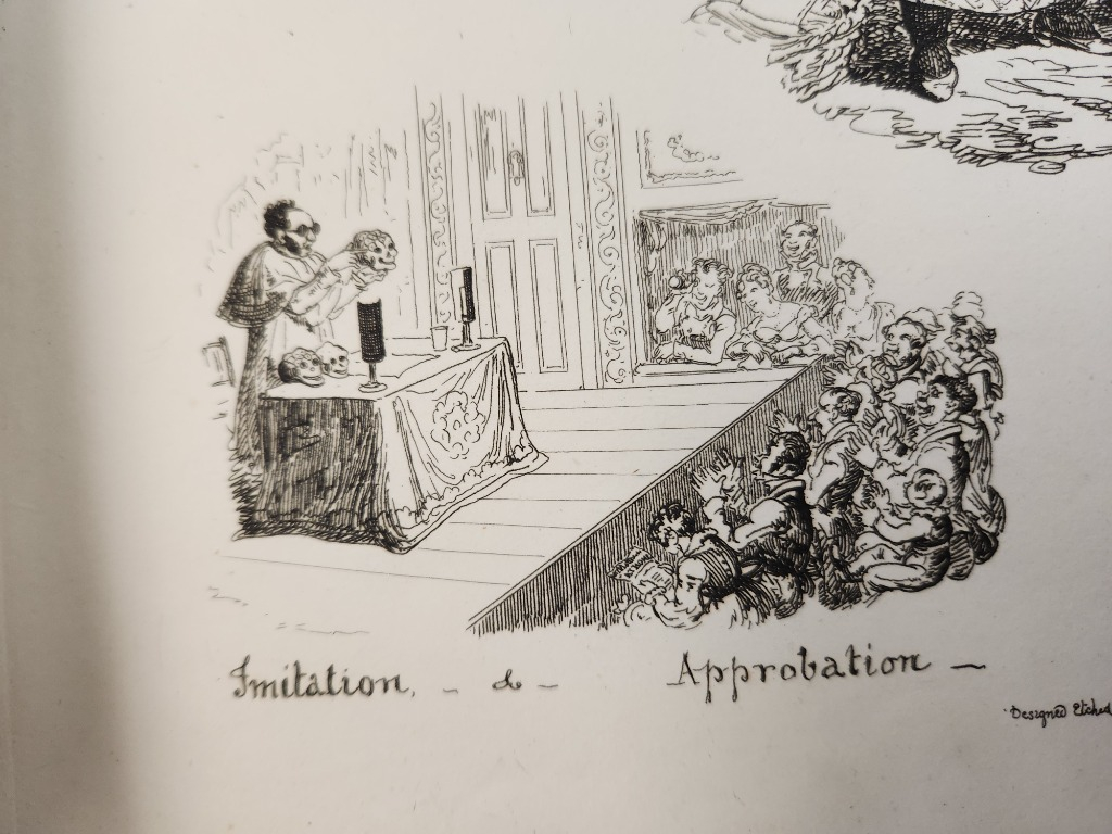 A man wearing a lab coat and goggles standing on a stage is holding a skull as he addresses an audience.