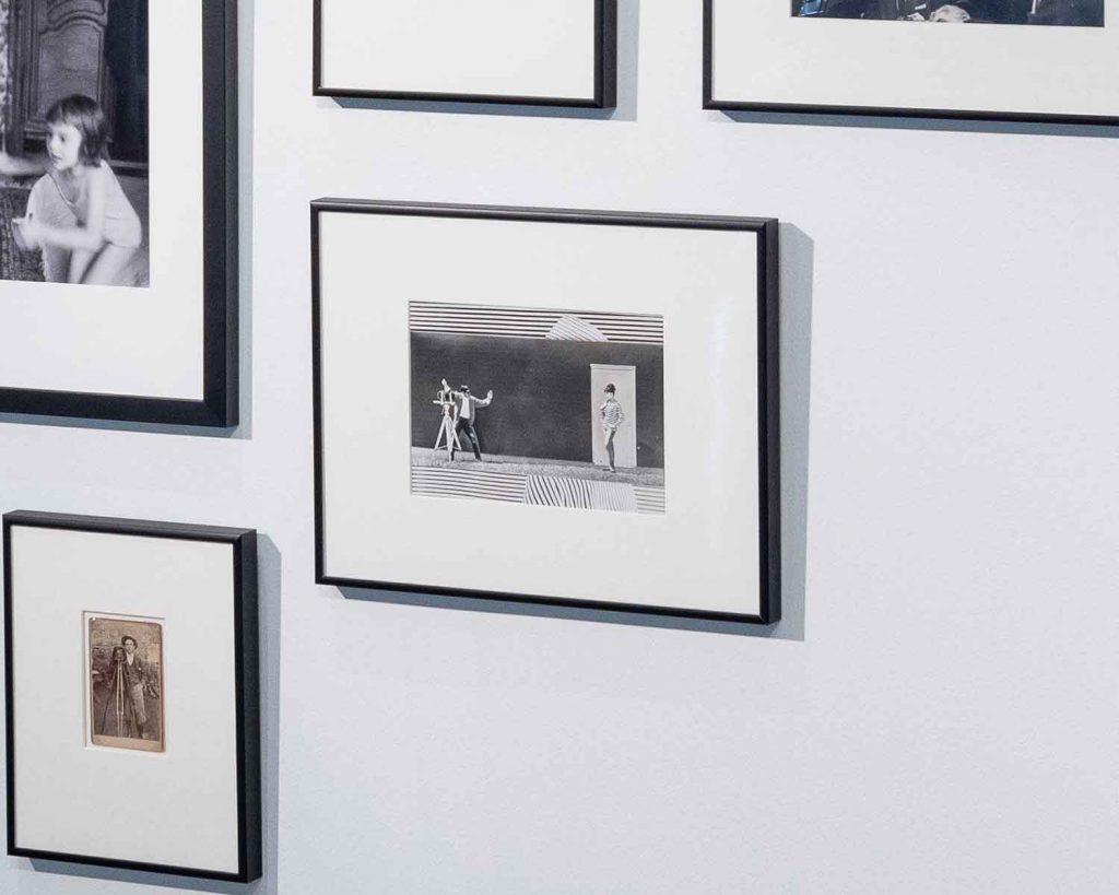 Framed photographs on exhibition