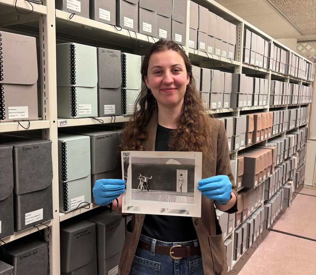 Woman holding a photograph